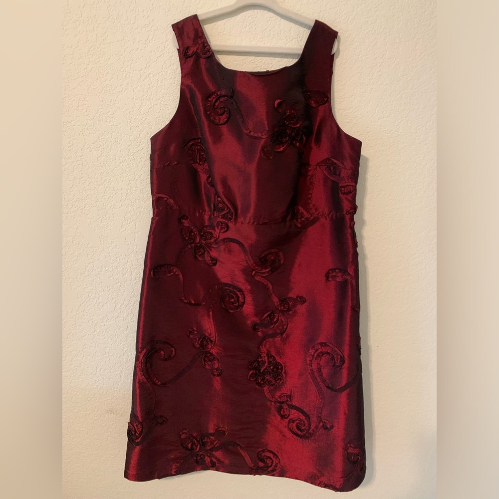 Lovely red formal dress. Worn once and dry cleaned. Size 6P.